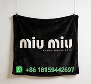 Miumiu Throw Blankets